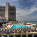 The Hilton Tel Aviv features a large outdoor pool overlooking the Mediterranean Sea. The spacious, air conditioned rooms offer a flat-screen TV and a balcony.