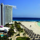 Overlooking the Caribbean Sea and Nichupte Lagoon, only steps from the beach, this hotel in Cancun, Mexico offers a bi-level outdoor pool, private beach, full-service spa and on-site dining options.