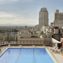 This classic hotel, conveniently located on Madrids Gran Vía, has a seasonal rooftop swimming pool and a seasonal terrace with fantastic city views.