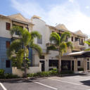 Cairns Queens Court is a boutique hotel located in central Cairns, offering affordable accommodation with an outdoor swimming pool and free off-street parking.