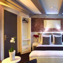 Hotel CC features boutique-style rooms with air conditioning in 3 picturesque historic buildings. It is 350 metres from Amsterdam Central Railway Station which offers tram and metro connections.